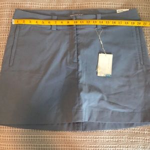 Nice Nike golf skort. New with tags. Never worn. Measurements are in the photos.